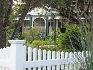 Cottage style scallop white picket fence from Big Country PVC Fencing