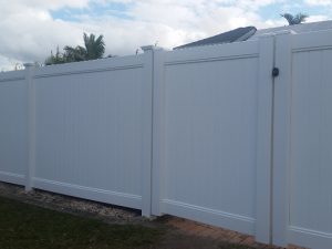 Full height privacy fencing with double height privacy gates
