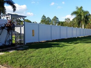 Full height PVC privacy fencing with portico