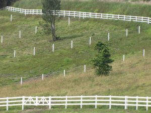 PVC Post and Rail Fencing Systems for sloping properties